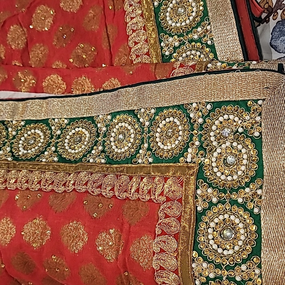 Brand new red sari with green blouse